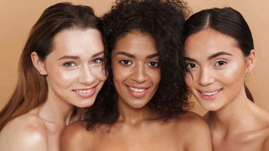 The Best Dermal Fillers for Every Age: What to Get in Your 20s, 30s, 40s & Beyond 2 three happy women posing together